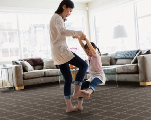 Baby playing with mom | Myers Flooring of Nashville