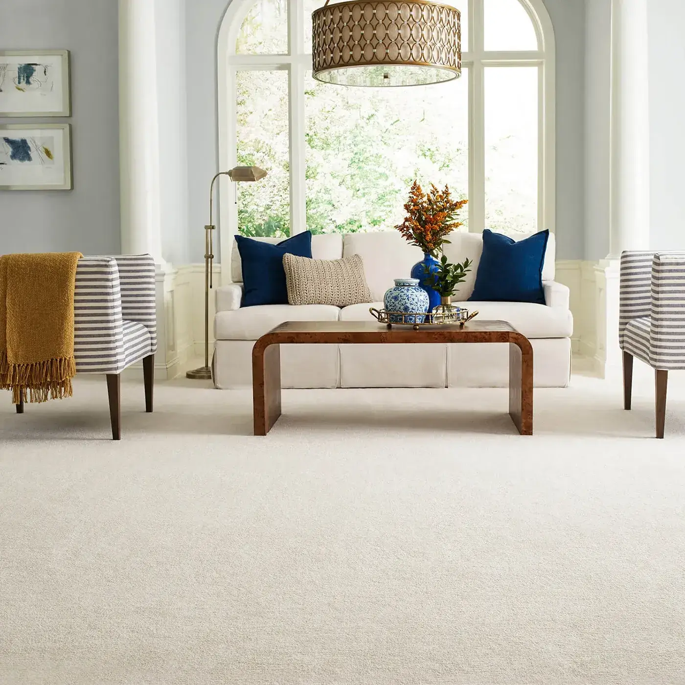 FindYourComfortNovelSolid-EA816-00153-ChampagneToast-H Champagne Color Shaw Floors carpet in living room | Myers Flooring of Nashville