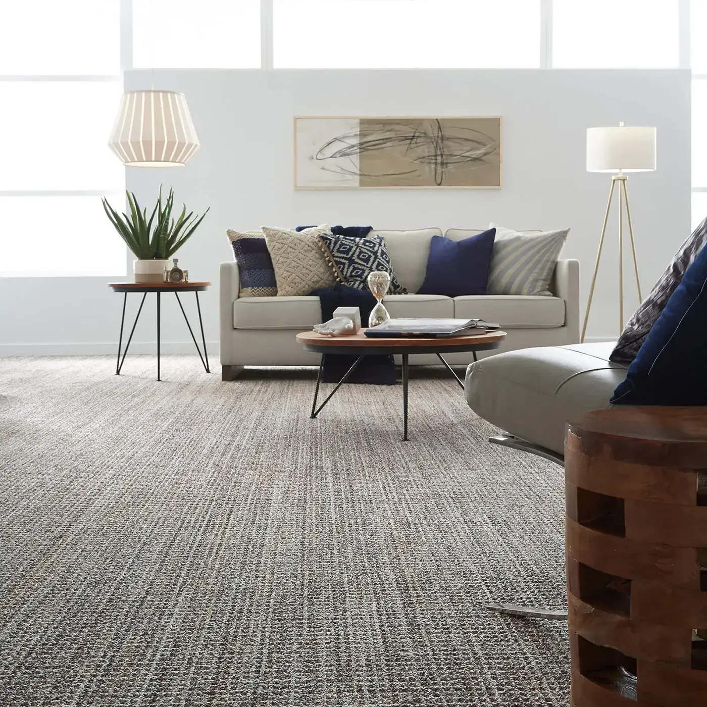 SUNDANCE-ZZ039-JURA-GREY-00525-V Textured gray Shaw Floors carpet in a modern living room | Myers Flooring of Nashville